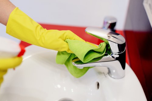 Carpet cleaning team working safely with equipment in a managed indoor environment